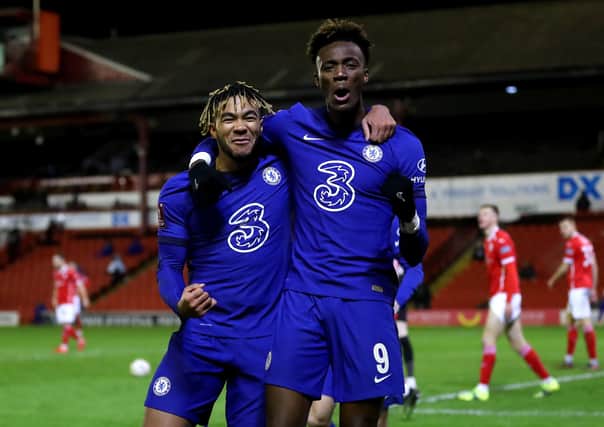 Chelsea's Tammy Abraham (right) celebrates with team-mate Reece James after scoring the winner against Barnsley.