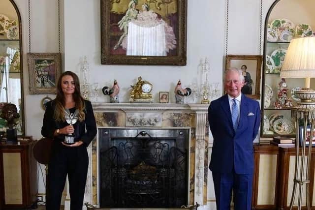 Vocal campaigner against domestic abuse, Rebecca Beattie, who is also an ambassador for The Prince's Trust, pictured with Charles, Prince of Wales