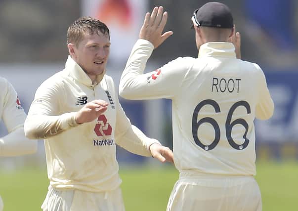Dom Bess celebrates a wicket with Joe Root who has now axed the spinner from the second Test (Picture: via ECB)