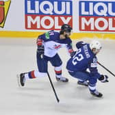 INTERNATIONAL AMBITION: Great Britain's Liam Kirk battles for the puck with France's Charles Bertrand in the Group A clash at the World Championships in slovakia in May 2019. Picture: Dean Woolley/MB Media/Getty Images