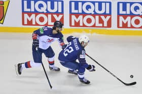 INTERNATIONAL AMBITION: Great Britain's Liam Kirk battles for the puck with France's Charles Bertrand in the Group A clash at the World Championships in slovakia in May 2019. Picture: Dean Woolley/MB Media/Getty Images