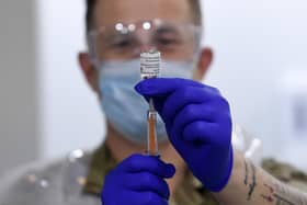 Opening of the new vaccination centre at Elland Road, Leeds. Sgt Phil Morris from the Royal Regimental Aid Post 4th Battalion, Scottish Regiment, prepares the AstraZeneca vaccine on February 8. Picture by Simon Hulme.