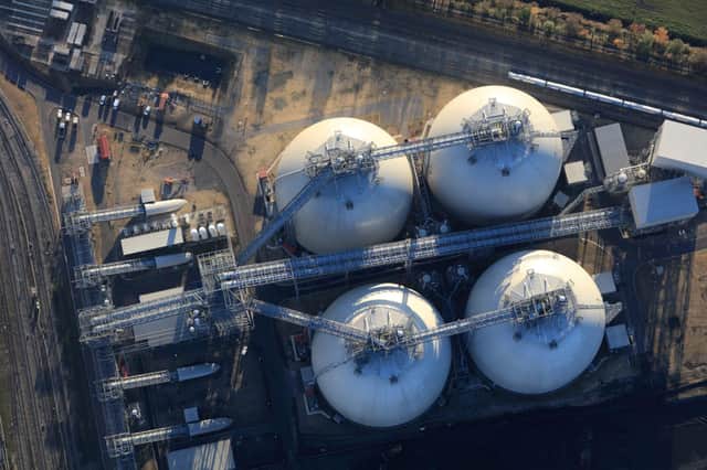 The four biomass storage domes at Drax Power Station can hold  a total of 300,000 tonnes of compressed wood pellets.