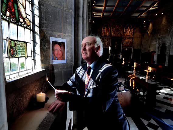 Peter Lawrence, the father of Claudia Lawrence, who went missing in York in 2009, is pictured reflecting on  2,000 days without his daughter in 2014. Mr Lawrence lit a candle for his daughter in the Chapel of Paulinus of York and Hilda of Whitby at Bishopthorpe Palace on the outskirts of York. (Picture: James Hardisty.)