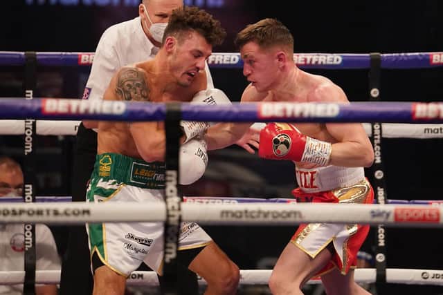 TRADING BLOWS: Leigh Wood and Reece Mould. Picture: Dave Thompson/Matchroom Boxing