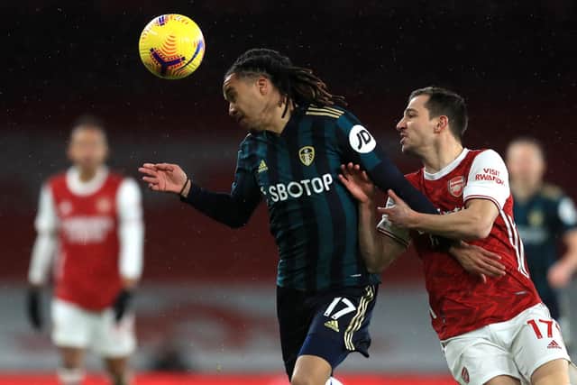 Leeds United's Helder Costa (left) and Arsenal's Cedric Soares battle for the ball (Picture: PA)
