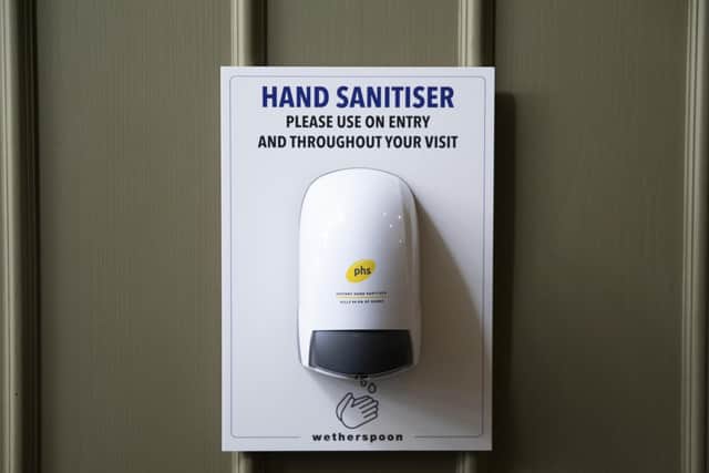 Scientists are researching the use of 'smart' hand sanitising machines which collect data on how often people are using them. Picture: Getty
