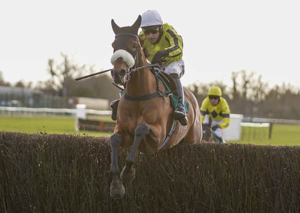 Harry Skelton riding Allmankind on their way to winning The Agetur UK Kingmaker Novices' Chase at Warwick.