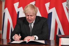 This was Boris Johnson signing the UK-EU trade deal.