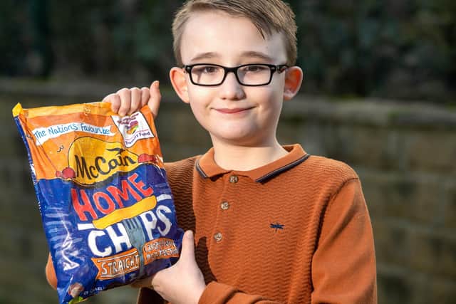 Charlie beat 250 other children to win the national competition to have his design on McCain's Home Chips raising money for Family Fund,  the charity that helps him.Picture Bruce Rollinson