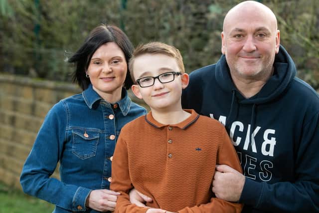 10 year old Charlie Conway has autism and a brain injury. the pandemic has been challenging and his family have been helped by the charity Family Fund. Now Charlie has won a national competition to have his design on McCain's Home Chips raising money for the charity that helps him.
Pictured with his mum and dad, Kate Conway and Andrew Phillips.  Picture Bruce Rollinson