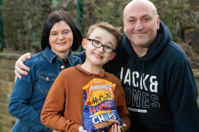 Charlie pictured with his mum and dad, Katie Conway and Andrew Phillips.
15 February 2021.  Picture Bruce Rollinson