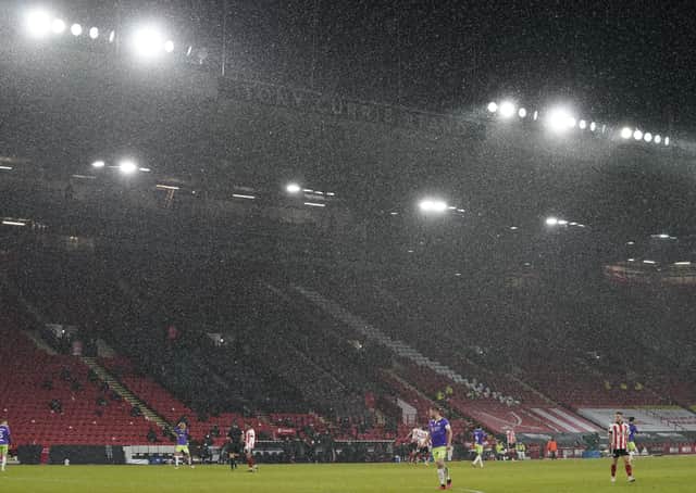 Snow joke: The FA Cup match at Bramall Lane overcame the weather but many matches have been postponed by it and the pandemic. Picture: Andrew Yates/Sportimage