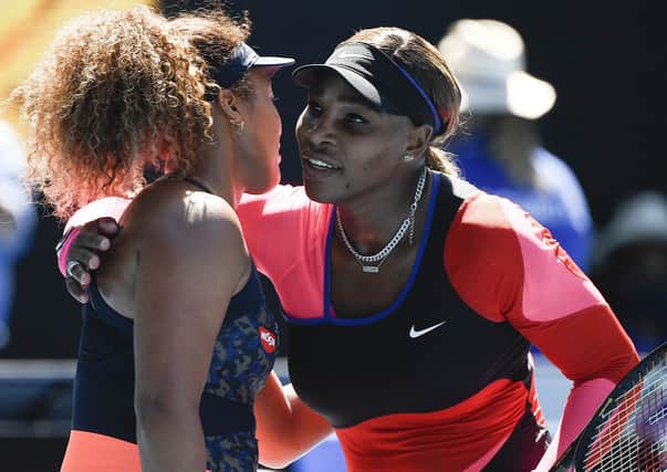 Well done: Japan's Naomi Osaka, left, is congratulated by Serena Williams. Picture: AP Photo/Andy Brownbill