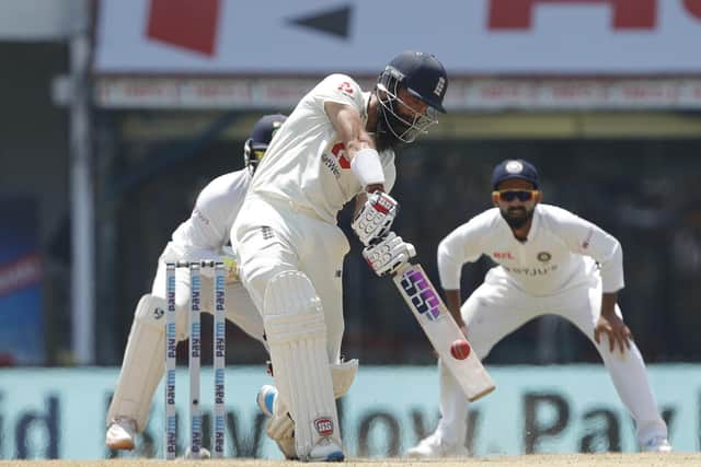 In demand: Moeen Ali strikes a boundary in the second test against India at the Chidambaram Stadium in Chennai. Picture: BCCI