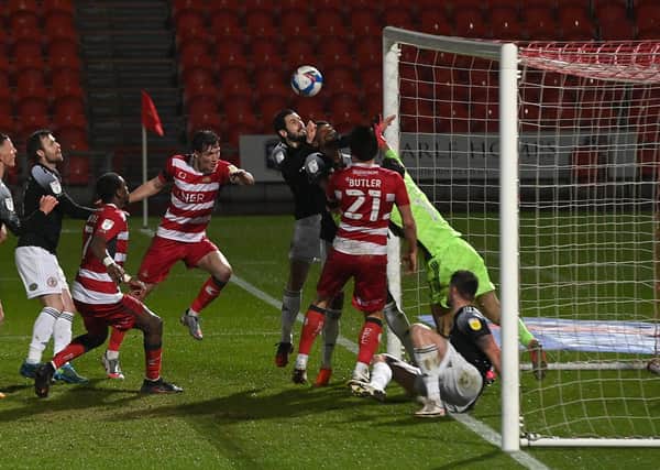 Accrington's defence clear the ball off the line. Picture: Andrew Roe/AHPIX