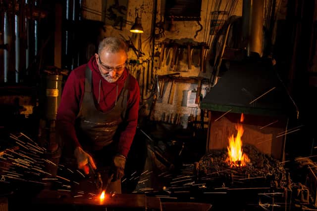 Blacksmith David Stephenson at work in his Smithy at Lockton on the North York Moors. Picture Bruce Rollinson
