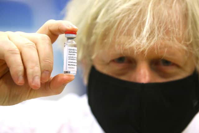 Boris Johnson is linking the lifting of the lockdown to the success of the Covid vaccine programme.