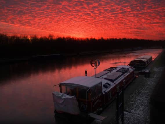 Sunrise at Lemoroyd Lock, Methley, on February 12 2021. Picture by Simon Hulme.