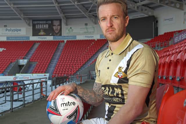 GOLDEN BOY: Doncaster Rovers' James Coppinger, wearing the club's third kit, which he designed himself to celebrate his 17 seasons at the club.
 Picture: Andrew Roe/AHPIX LTD