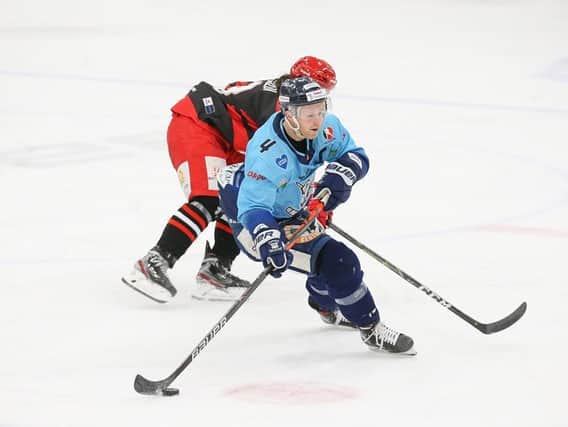 BACK IN THE GAME: Sheffield Steeldogs' captain Lewis Bell, in action against Swindon last Sunday at Ice Sheffield. Picture courtesy of Podium Prints/Steeldogs Media.