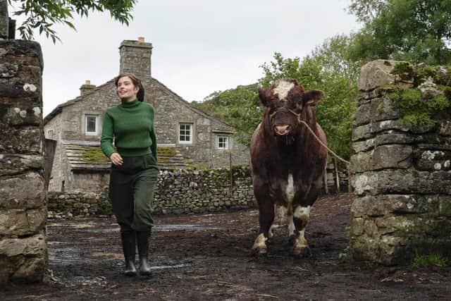 Farming implements and machinery from the 1930s or earlier are also needed. Pictured is farmer Helen Alderson who has captured James Herriot's heart.