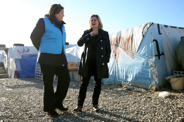 Justine Greening (right) during a visit to an Informal Tented Settlement occupied by Syrian refuges close to the Syrian boarder in Lebanon, to see how the UK's response and aid is helping the refugee crisis.