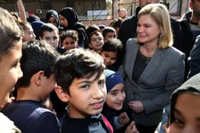 Justine Greening, the then International Development Secretary,  during a tour of the Bourj Hammoud School, a mixed school teaching Lebanese and Syrian children in Beirut, Lebanon, to see how the UK's response and aid was helping the refugee crisis in 2016.