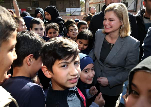 Justine Greening, the then International Development Secretary,  during a tour of the Bourj Hammoud School, a mixed school teaching Lebanese and Syrian children in Beirut, Lebanon, to see how the UK's response and aid was helping the refugee crisis in 2016.