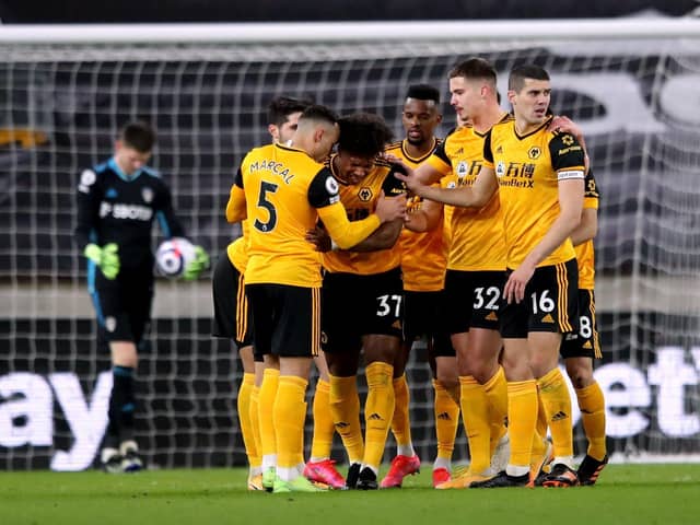 Wolverhampton Wanderers' players celebrate after Leeds United goalkeeper Illan Meslier scores an own goal. Pictures: PA.
