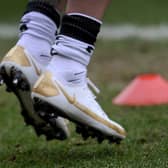 The specially designed golden boots worn by James Coppinger. Picture: Simon Hulme.