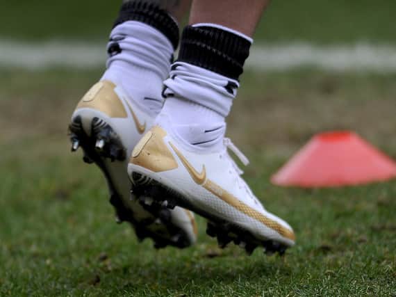 The specially designed golden boots worn by James Coppinger. Picture: Simon Hulme.