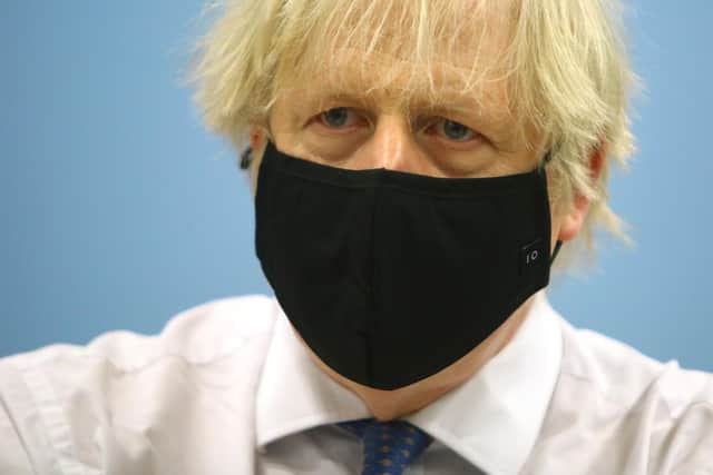 Prime minister Boris Johnson during a visit to a Covid-19 vaccination centre at Cwmbran Stadium in Cwmbran, south Wales. Photo: PA