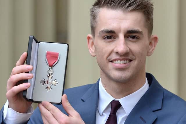Gold medal winning Olympic gymnast Max Whitlock pictured after he received his Member of the Order of British Empire (MBE) medal during an Investiture ceremony at Buckingham Palace, London in 2017. Photo credit: John Stillwell/PA Wire