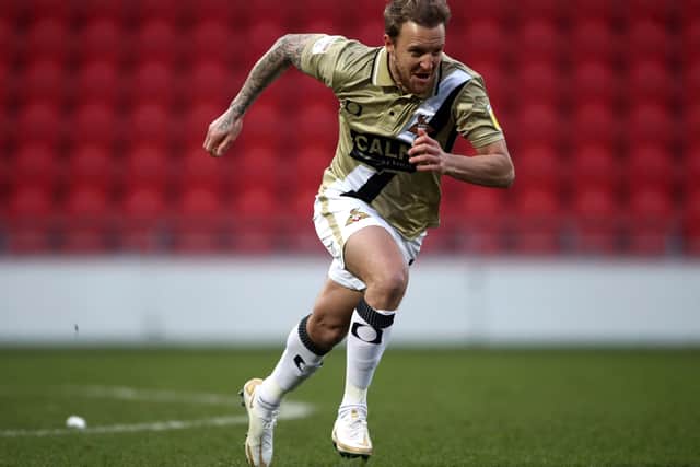 Doncaster Rovers' James Coppinger celebrates scoring their side's equaliser (Picture: PA)