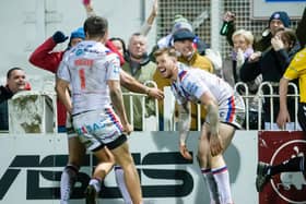 BACK: Wakefield Trinity's Tom Johnstone celebrates after scoring against Hull FC in their last Super League home game in front of crowds at Belle Vue on March 6 last year. (ALLAN MCKENZIE/SWPIX)