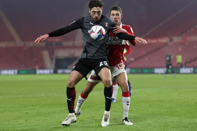 INJURY CONCERN: Rotherham United's Matt Crooks, left, is doubtful with an ankle injury. Picture: Martin Rickett/PA
