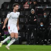 KEEPING THE FAITH: Rotherham United manager Paul Warne shouts encouragement in last week's Championship clash against Bournemouth at Vitality Stadium. Picture: Mike Hewitt/Getty Images