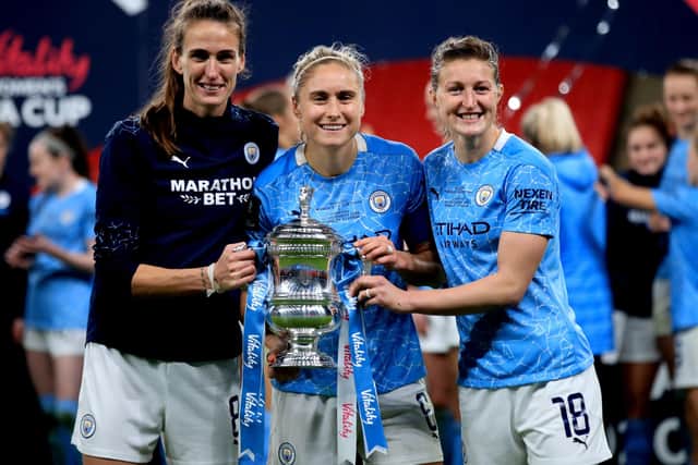 WINNERS: Manchester City's Jill Scott (left), Steph Houghton and Ellen White celebrate with the trophy after winning the Women's FA Cup Final at Wembley last year. Picture: Adam Davy/PA