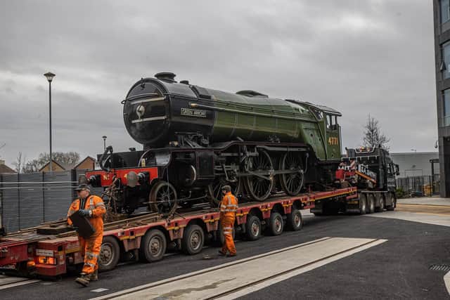 The Green Arrow locomotive arrives in Doncaster after being transported by road from the National Railway Museum's sister attraction, Locomotive in Shildon in County Durham. The famous engine, which was built in Doncaster in 1932, will go on show at a new rail heritage centre, the Danum Gallery, Library and Museum in the South Yorkshire town. (Picture: Charlotte Graham.)