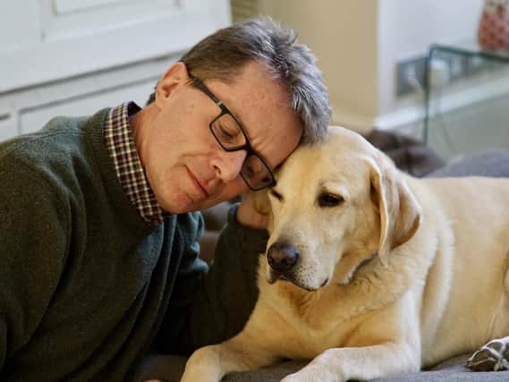 Nicky Campbell with his dog Maxwell. Credit: PA.