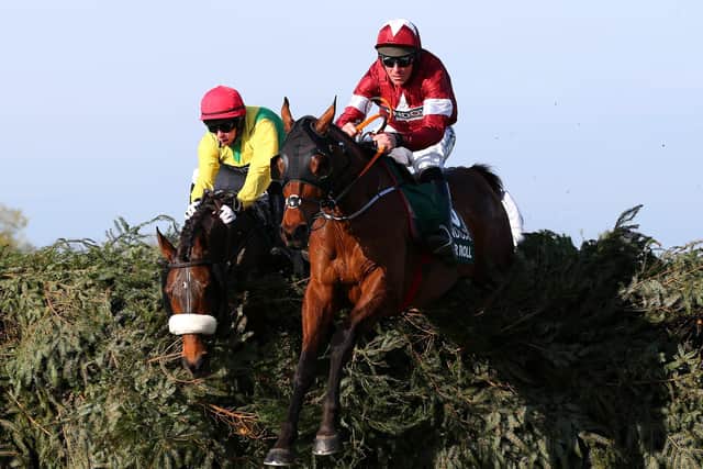 Dual Randox Grand National winner Tiger Roll clears the last in the 2019 race.