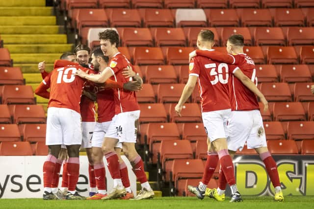 ON THE UP:  Barnsley's Daryl Dike celebrates after scoring his first goal for the club, against Stoke City on Wednesday night. Picture: Tony Johnson