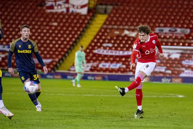 Barnsley's Callum Styles drills home his first-half goal against Stoke City at Oakwellon Wednesday night. Picture: Tony Johnson