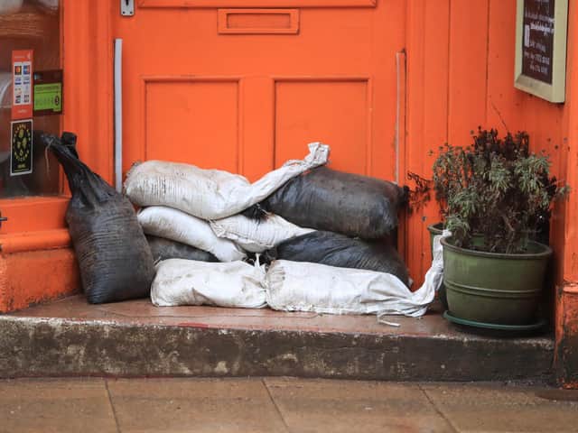 Sand bags placed against a door of a property in Hebden Bridge in the Upper Calder Valley in West Yorkshire, in anticipation of Storm Christoph last month. Photo: PA