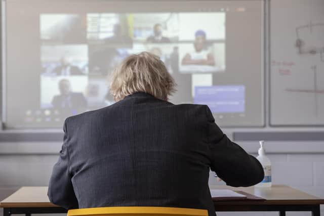 Prime Minister Boris Johnson takes part in an online class during a visit to Sedgehill School in Lewisham, south east London, to see preparations for students returning to school.