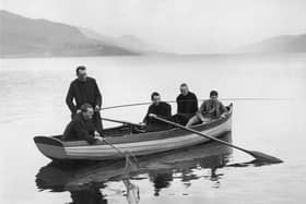 23rd February 1935:  A group of monks from the Fort Augustus Abbey go angling on Loch Ness which is famed for its mythical monster. References to a monster in Loch Ness date back to St Columba's biography, 565 AD, where Adamnan describes St Columba preventing a creature in the Loch eating a Pict. More than 1,000 people claim to have seen 'Nessie' and the area is a popular tourist attraction.  (Photo by Reg Speller/Fox Photos/Getty Images)