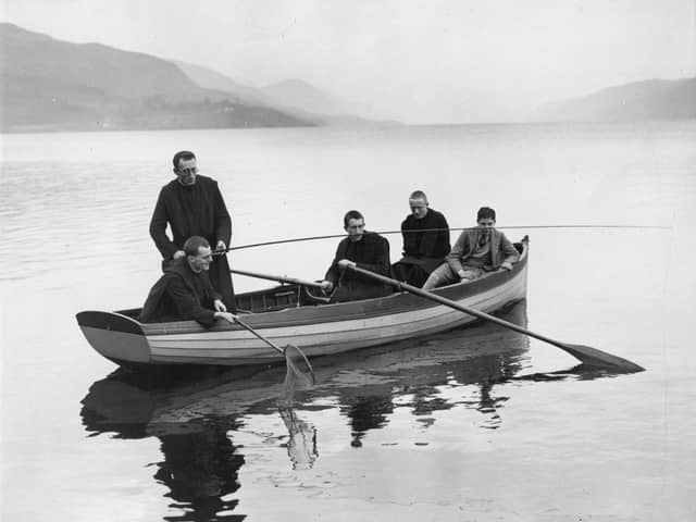 23rd February 1935:  A group of monks from the Fort Augustus Abbey go angling on Loch Ness which is famed for its mythical monster. References to a monster in Loch Ness date back to St Columba's biography, 565 AD, where Adamnan describes St Columba preventing a creature in the Loch eating a Pict. More than 1,000 people claim to have seen 'Nessie' and the area is a popular tourist attraction.  (Photo by Reg Speller/Fox Photos/Getty Images)