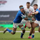 England's Henry Slade is tackled by Italy's Niccolo Cannone and Luca Sperandio during the Guinness Six Nations. Picture: PA.