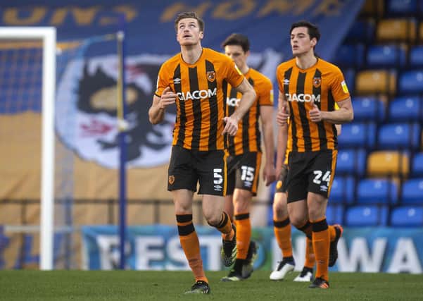 On target: Hull's Reece Burke looks to the sky after scoring his side's second goa. Picture: Victoria Jones/PA